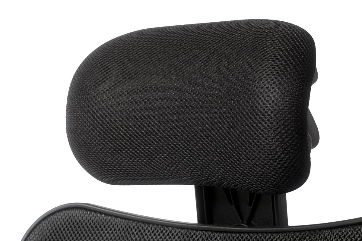 Close-up of a chair headrest designed for neck support, highlighting its ergonomic shape for comfort during long hours of work.
