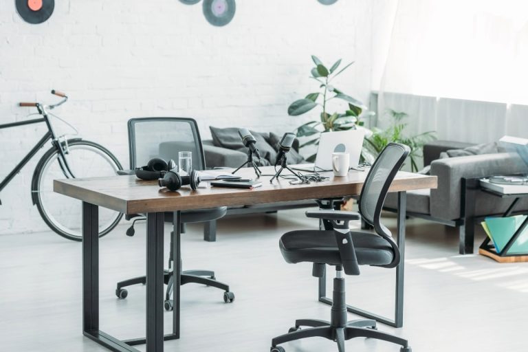 A stylish office setup with an ergonomic office chair in focus, demonstrating key features for office chair support including adjustable height and lumbar support.