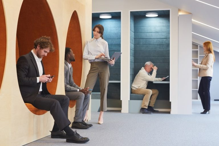 Employees engaged in various activities in unique meeting room designs, illustrating the significance of meeting room variety for productivity and comfort in the office.
