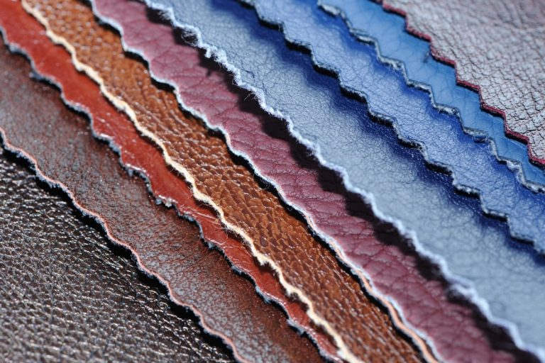 Coloured fabric samples demonstrating the benefits of using vinyl material for office furniture.