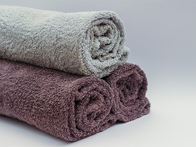 A rolled towel can give you support to improve posture