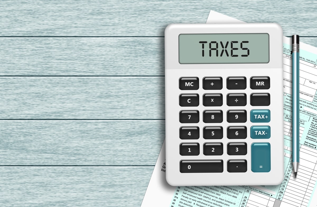 A calculator with TAXES entered in the display to show how you can claim home office expenses on your tax return.