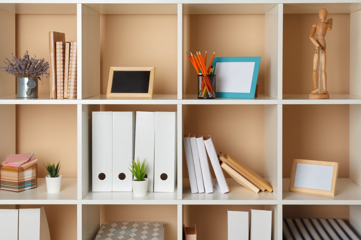 A bookcase used for home office storage, making use of vertical space. 